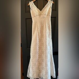 Beautiful lace Wedding dress. The lace detail is absolutely stunning.